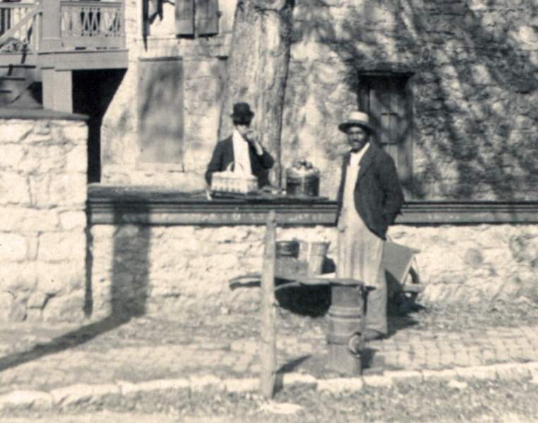 Noah Pinkney selling sandwiches outside Old East, Dickinson College, circa 1885