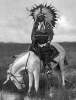 Cheyenne warrior chief on horseback, posed recreation, circa 1905