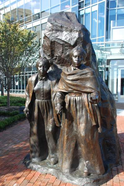 bronze monument, two women