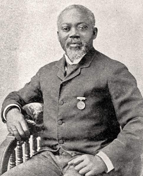 William Harvey Carney, seated, circa 1900